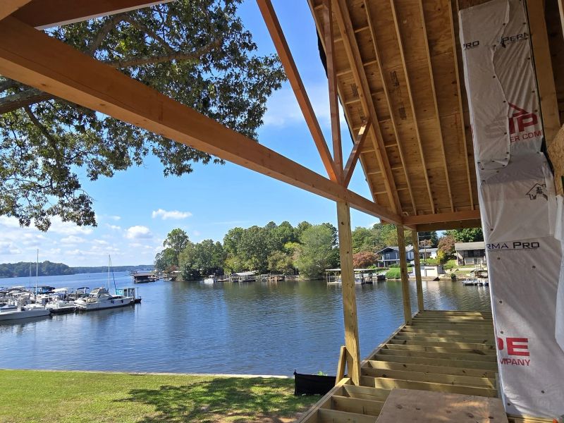Covered porch framing looking out over the lake