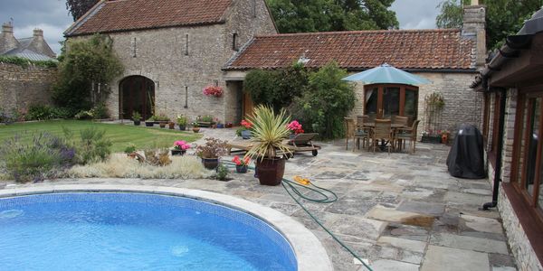 Farmhouse cottage with swimming pool work completed by Claygro