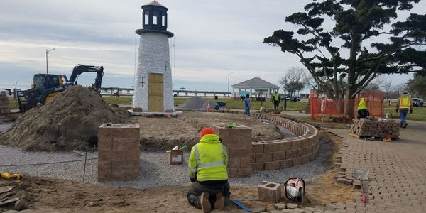 A Front View of Constructing a Small Light House in Middle of the Park.