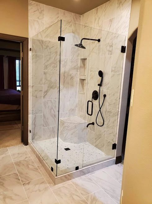 I oversaw the demo and build of this amazing shower, flooring, & cabinet (not shown)