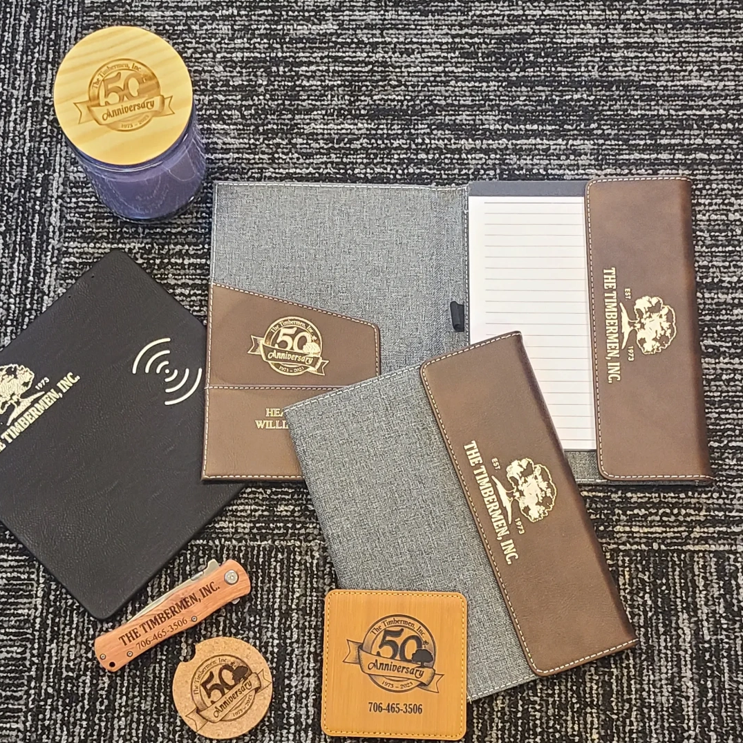 Custom branded office supplies and gifts celebrating The Timbermen, Inc.'s 50th anniversary.