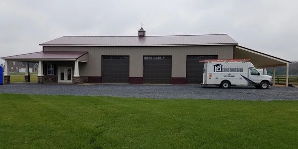 Metal pole building garage with corner porch and lean to