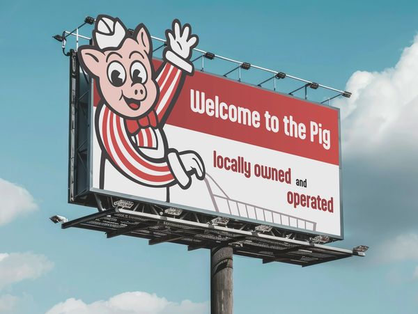 Billboard Mockup with Piggly Wiggly and the text "Welcome to the Pig, Locally owned and operated"