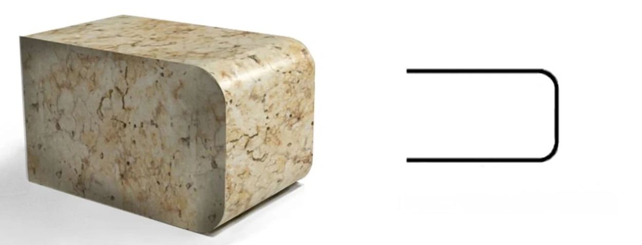 Stone block with rounded edges next to a simple U-shaped line drawing.