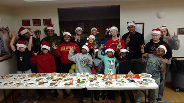 A group of people attending a Christmas party