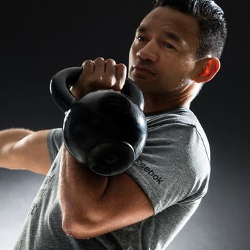 CrossFit coach Doha, Les Mills Qatar, group fitness trainer, fitness classes in Doha