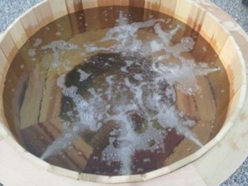 Cedar wood hot tub with water jets