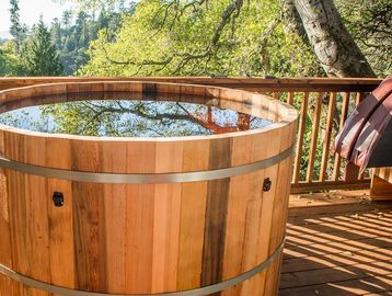 Cedar wood hot tub on decking