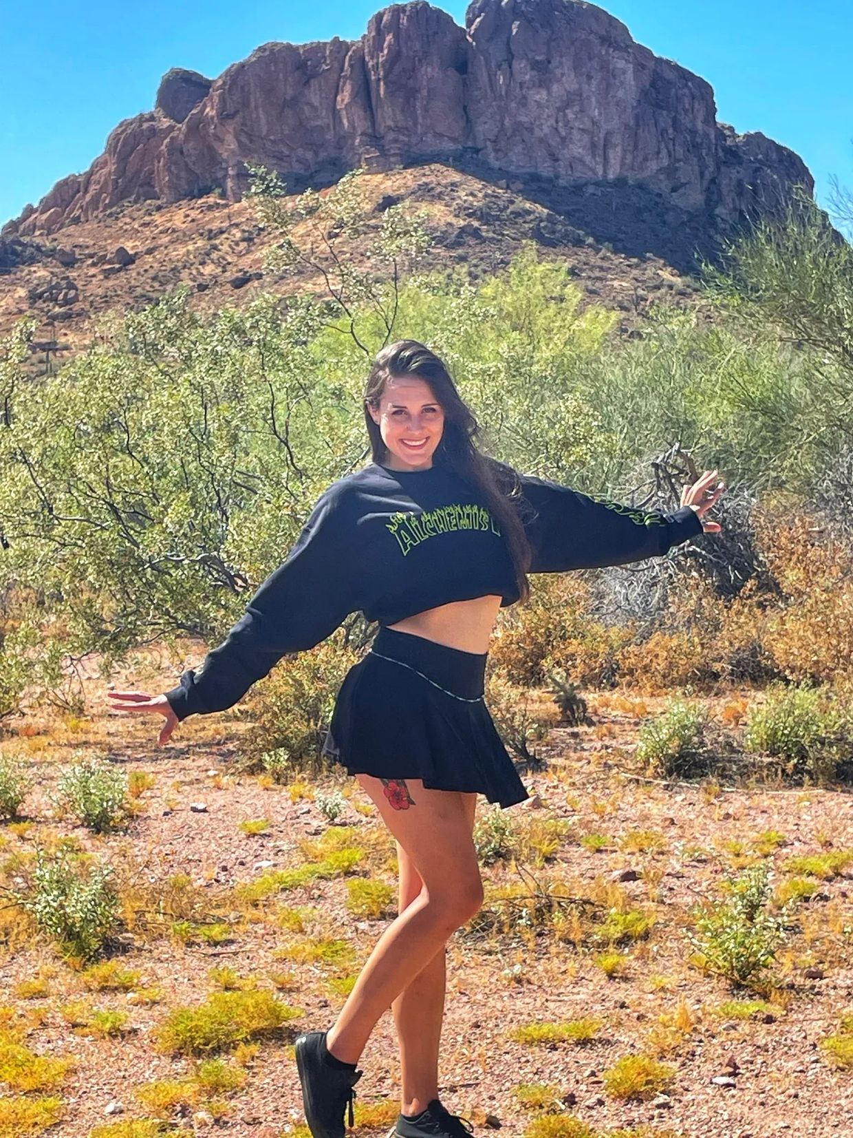 a picture of Madelyn Mazurek wearing a shirt that says alchemist