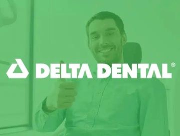 Smiling man giving thumbs up with Delta Dental logo overlay.