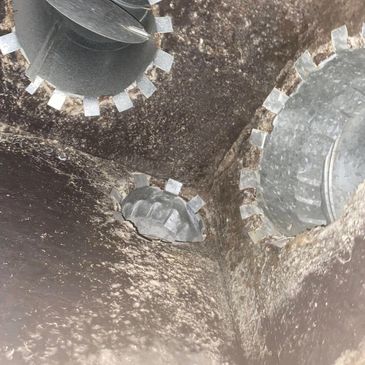 Metal gear-like components inside a mechanical device.