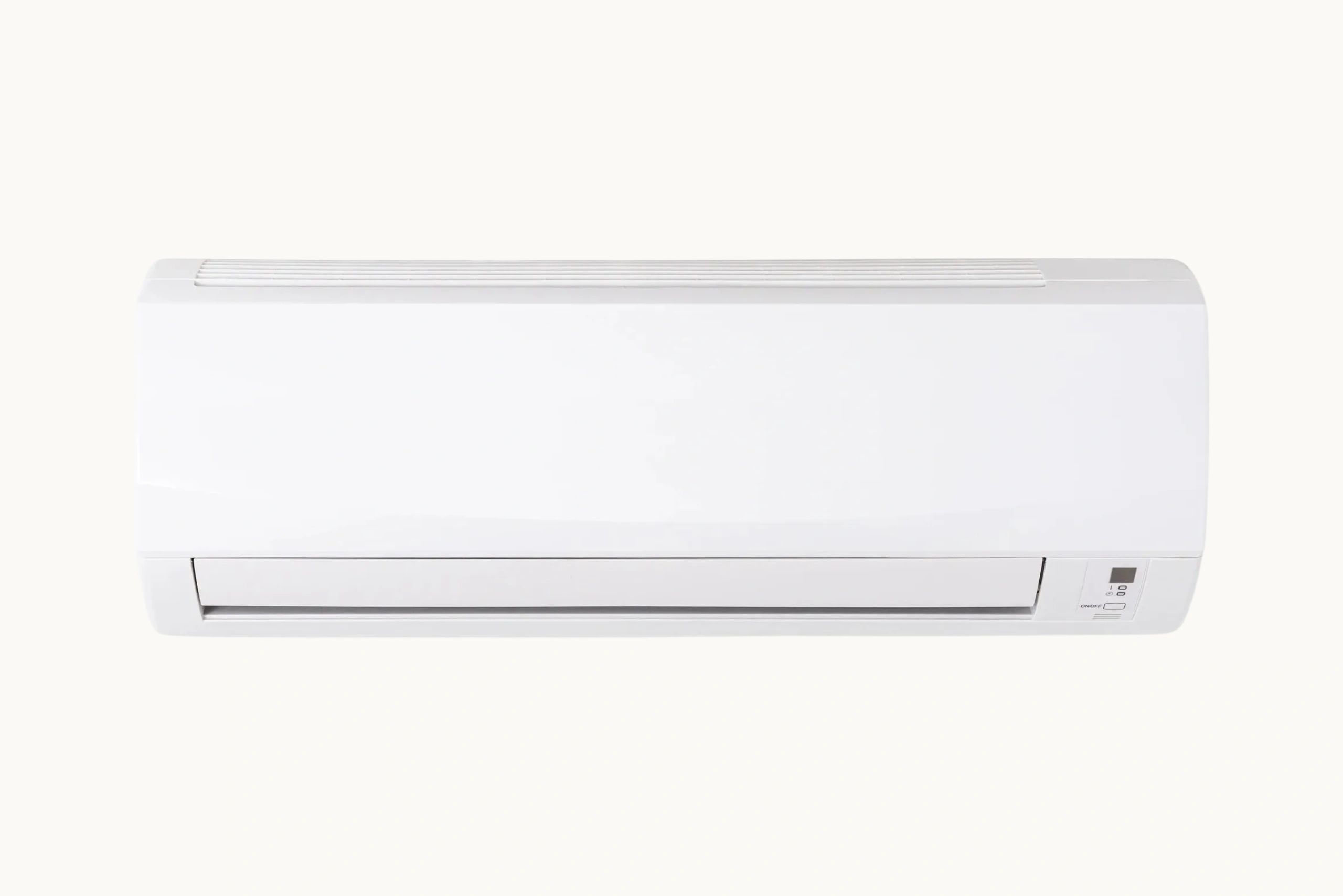 White wall-mounted air conditioner unit with vents and control panel.