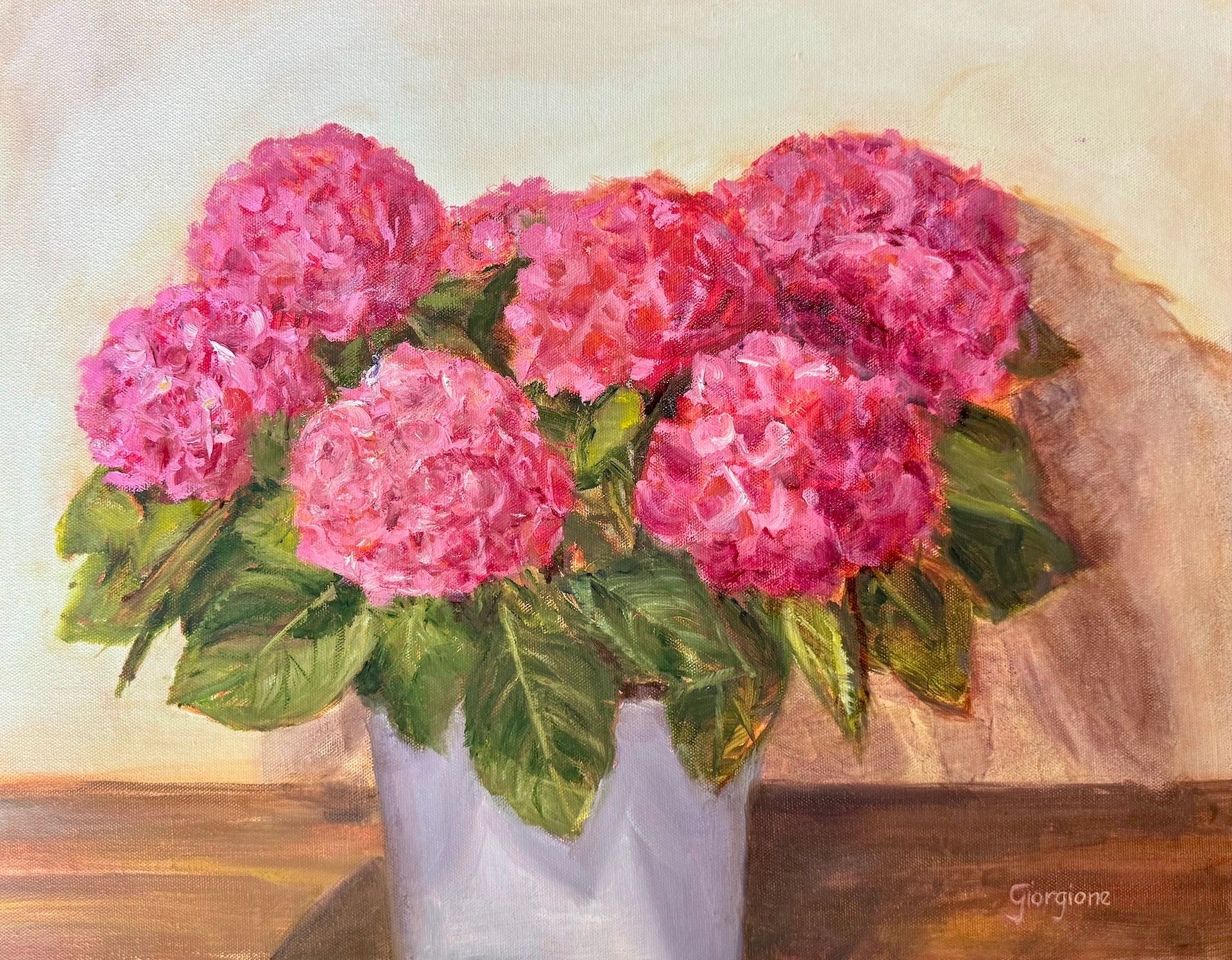 pink hydrangea flowers in white pot