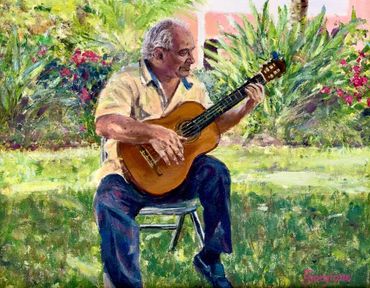 Man playing guitar, sitting down, outside, tropical flowers, Mateo Jampol