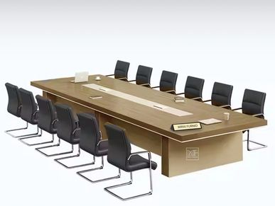 Office conference table with chairs and a laptop.
Meeting room setup with chairs and a laptop.

