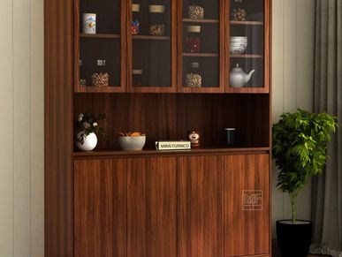 Stylish crockery unit made of wood with glass shelves. 