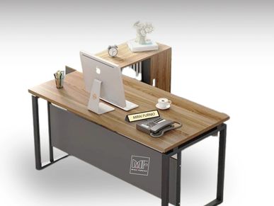 A laptop and phone on a managerial desk.
A laptop and phone on a managerial table. desk for managers.