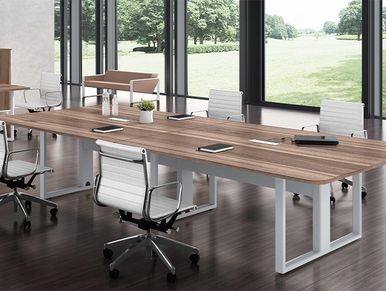 White metal-framed conference table.
Modern conference table with white metal frame.