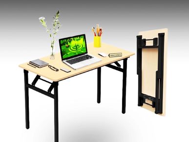 A laptop computer on a table with a foldable laptop stand. space saving furniture.