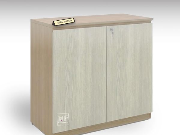Wooden storage cabinet with door and plaque.
Vintage storage wooden cabinet with door and plaque.