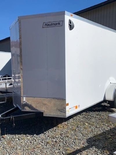 Haulmark Passport Deluxe 6' x 10' enclosed trailer with rear ramp, white exterior