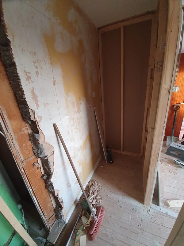 BEFORE: Old airing cupboard and part of the bedroom sectioned off to form the layout for a new ensui