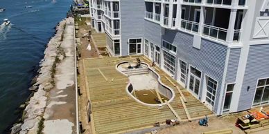 Commercial, new decking with upgraded safety railings around complete hotel 