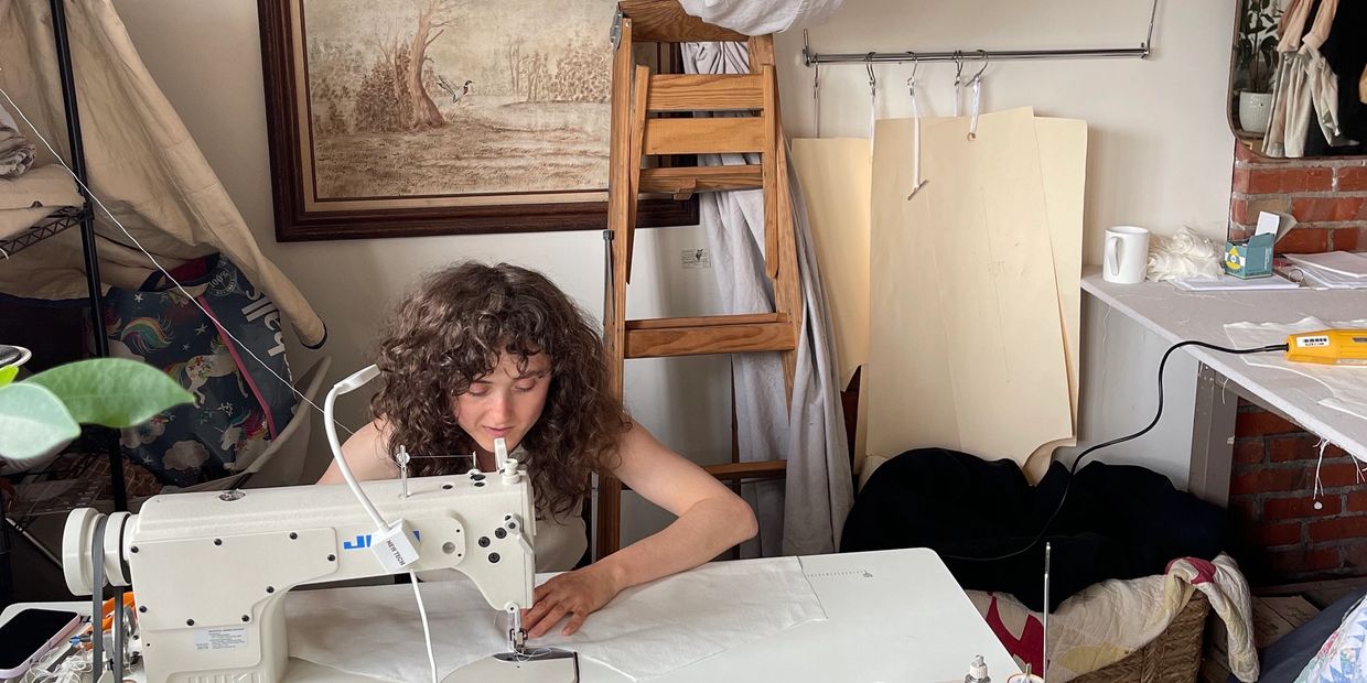 Me sewing, studio work.