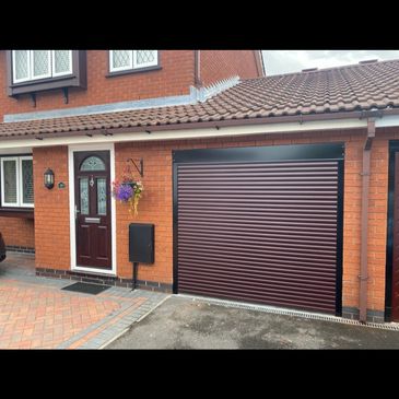 rosewood slat with black frame roller garage door