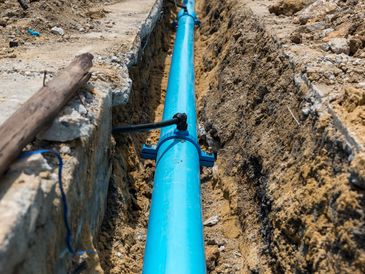 Construction site with new Water Pipes in the ground.