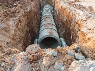 Concrete drainage pipe near the construction industry