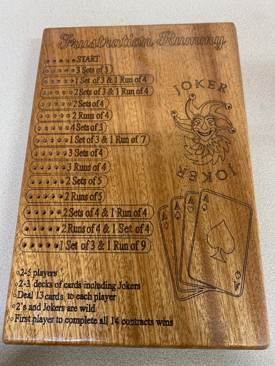 Hardwood Frustration Rummy game board with hardwood pegs.