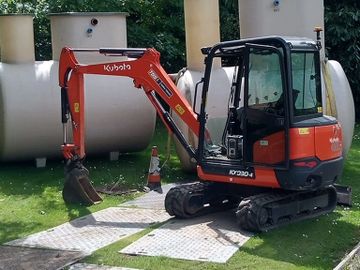 Sewage Treatment Plants next to a digger