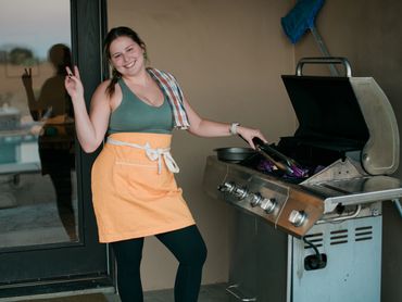 Woman smiling and grilling 
