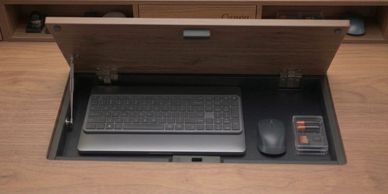 Conceal your laptop, keyboard, and mouse in CanvaDesk's flush, hidden storage.