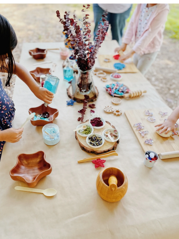 Potion mixing and play dough table.