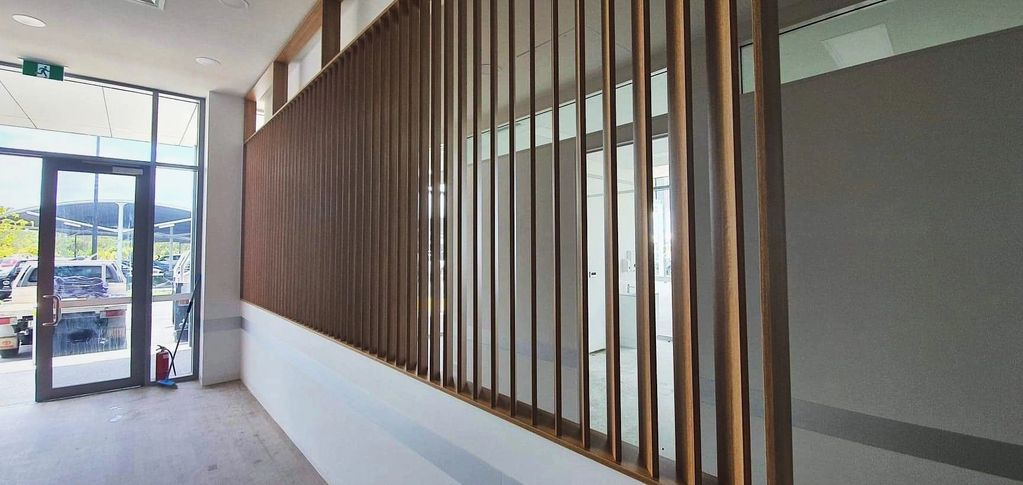Baringa Medical - feature timber screen