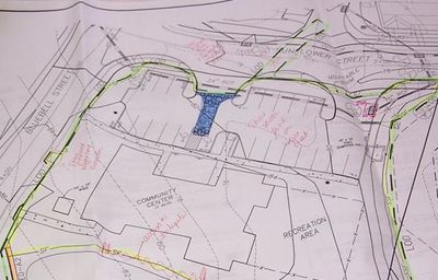 Architectural blueprint of a community center and recreation area with annotations.