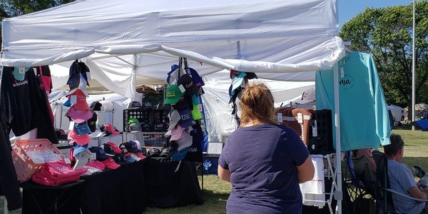 Shop of Threads Machine Embroidery Setting up in 2023 for the Schaumburg, Illinois Septemberfest.