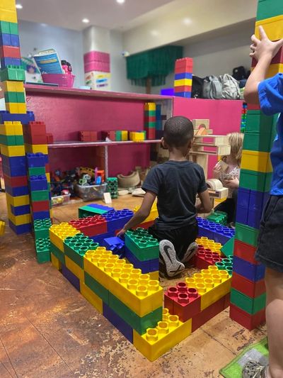 Kiddos having fun building huge places using imagination!