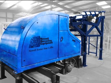 Blue industrial sorting machine by Newell Recycling Equipment.