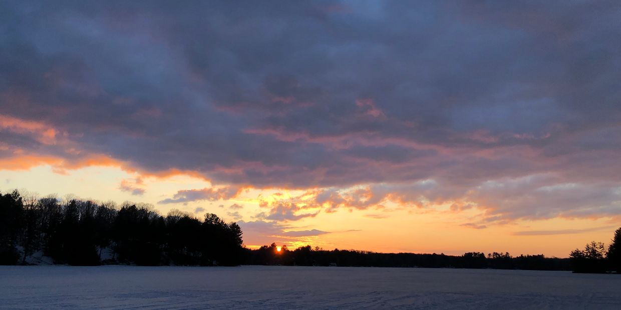 frozen lake sunset