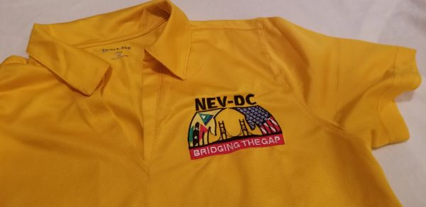Yellow polo shirt with NEV-DC logo and 'Bridging the Gap' text.