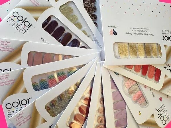 Various Color Street nail polish strips in different designs.