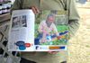 Worker from Landry Poche Strawberry Farm, Springfield La. featured in Baton Rouge Business Report.