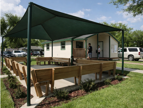  Outdoor seating under green canopy.
