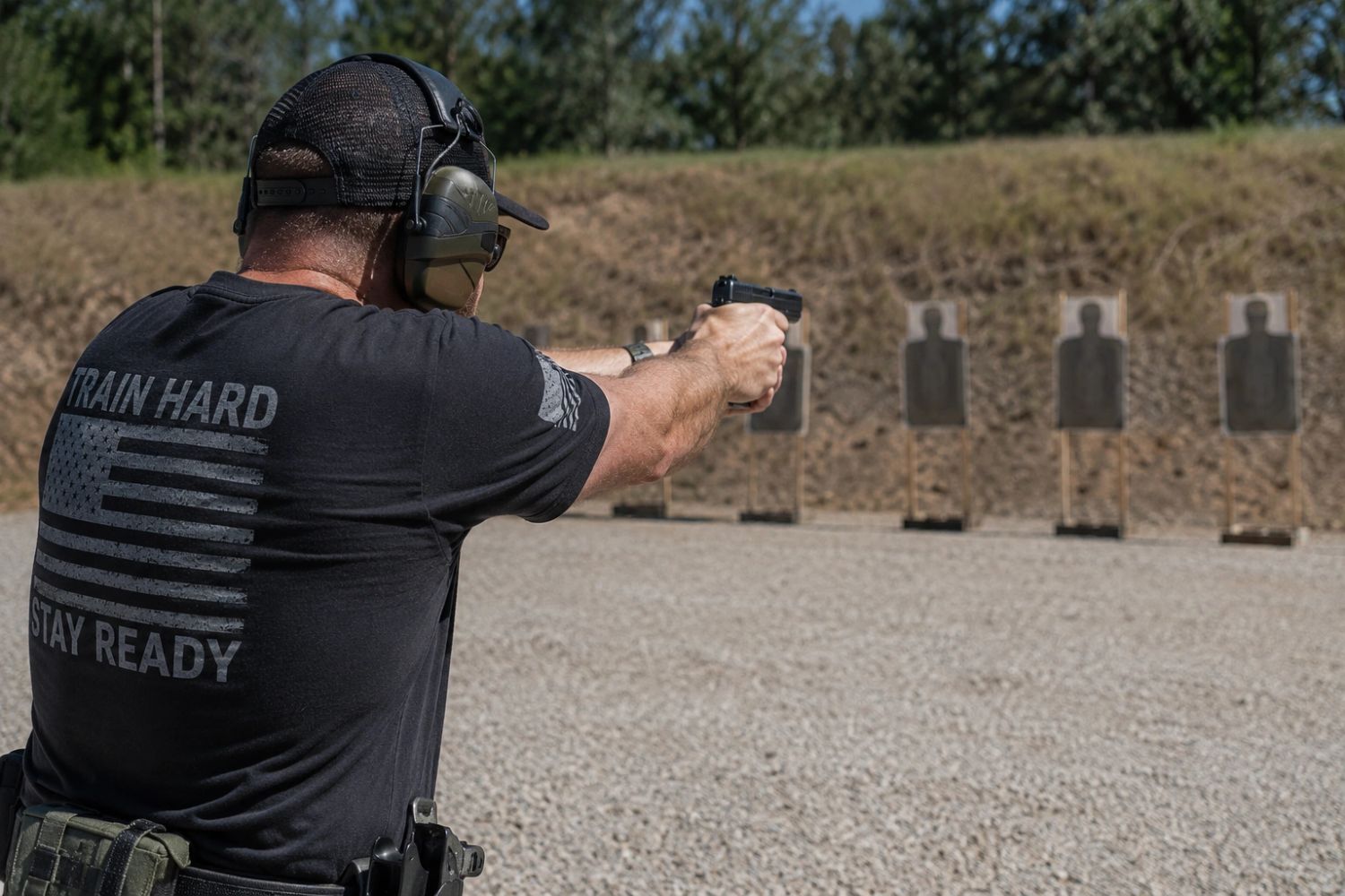 Man practicing shooting at a gun range.