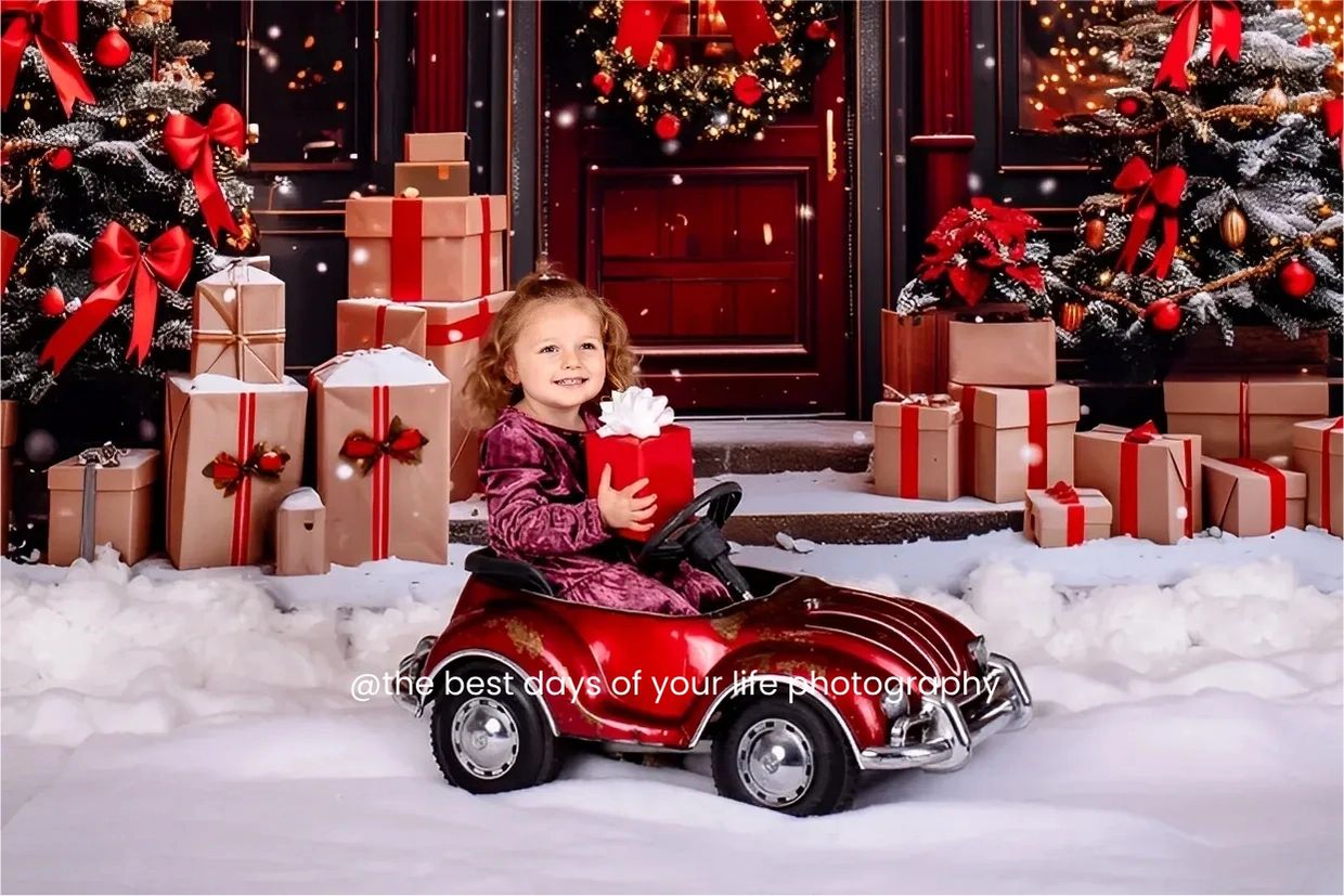 CHILD IN VINTAGE CAR HOLDING GIFT