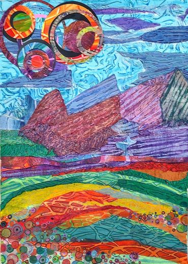Abstract colorful landscape with mountains and circular shapes in the sky.