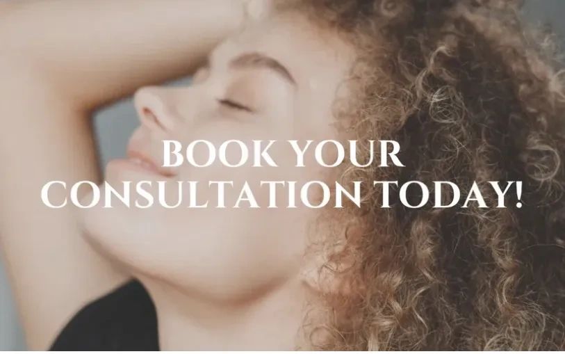 Woman with radiant skin, featuring permanent makeup: ombré brows, lip blush, and eyeliner